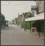 0138 Richting Ettensestraat. Rechts juwelier Peter Braam. Na de kruising met de Walstraat, het pand van het Waterschap ...