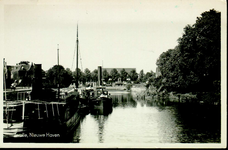 4190 PBKR2522 Gezicht vanaf de Nieuwe Havenbrug op de stadsgracht in de richting van de Harm Smeengekade, ca. 1940. De ...