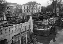 40812 Gezicht op de werkzaamheden ten behoeve van de bouw van een nieuwe Willemsbrug over de Stadsbuitengracht te ...