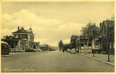 164820 Gezicht in de Stationsweg te Winschoten, met links het N.S.-station Winschoten.