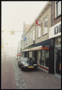 VHP002000060_0042 De Peperstraat hoort samen met de Hoogstraat en de Gouw tot de oudste straten van de stad. Al in de ...
