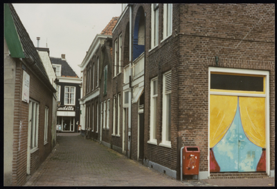 VHP002000099_0046 De Bultstraat loopt vanaf de Breedstraat in zuidelijke richting en stopt nu bij de Schoolsteeg. Voor ...