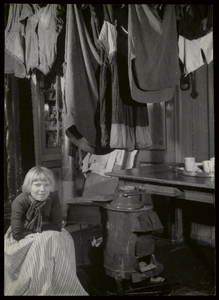 WAT003005796 De familie Kwakman. Foto in opdracht gemaakt van het gemeentebestuur door de Volendammer fotograaf C. Kil ...