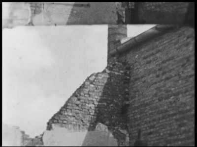 13455BB02572 Samenvatting: Reportage over de wederopbouw na de Tweede Wereldoorlog van het fabriekspand van de ...