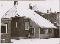 514 Woonhuis met besneeuwd dak