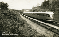 3497 Oosterbeek. Talud met dieseltrein, 1930-1940
