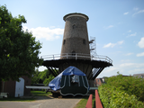 10800 steiger tegen romp van de molen, molen kap op de voorgrond onder zeil, 23-03-2009