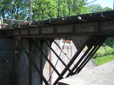 4555 onderkant brug met landhoofd (bruggenhoofd) met vermoedelijk in welijzeren boog (smeedijzer) spoorbrug Diefdijk, ...