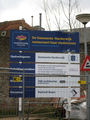 4696 bord van de aannemer met aankondiging restauratie van stadsmuren, vestingmuur tussen Strandboulevard Oost 1 en ...