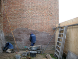 4699 vakmensen bezig met restauratie van stadsmuren, vestingmuur tussen Strandboulevard Oost 1 en Plantage 26, 11-03-2009