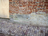 4707 onderkant (fundering) stadsmuur met verschillende steensoorten, vestingmuur tussen Strandboulevard Oost 1 en ...