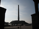 7891 steenfabriek Randwijk en schoorsteen in schemer, 10-01-2012